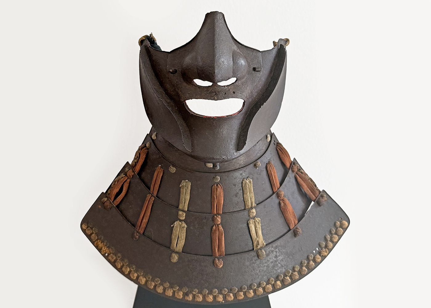 A large and Noble Russet iron Menpo – Ryūbu Style